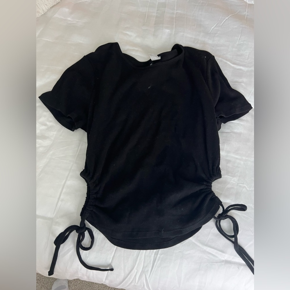 Black top with side slits! Never worn! H&M size large